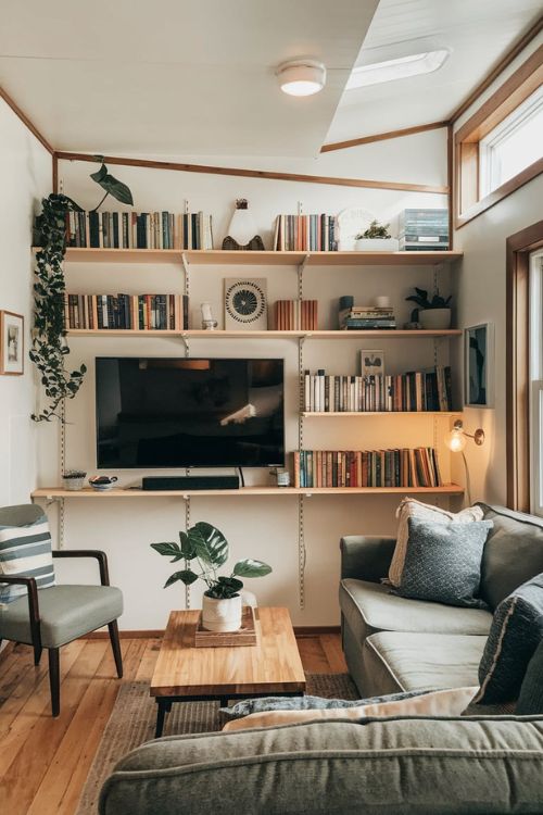 The Bookshelf Integration Tiny House Living Room with TV